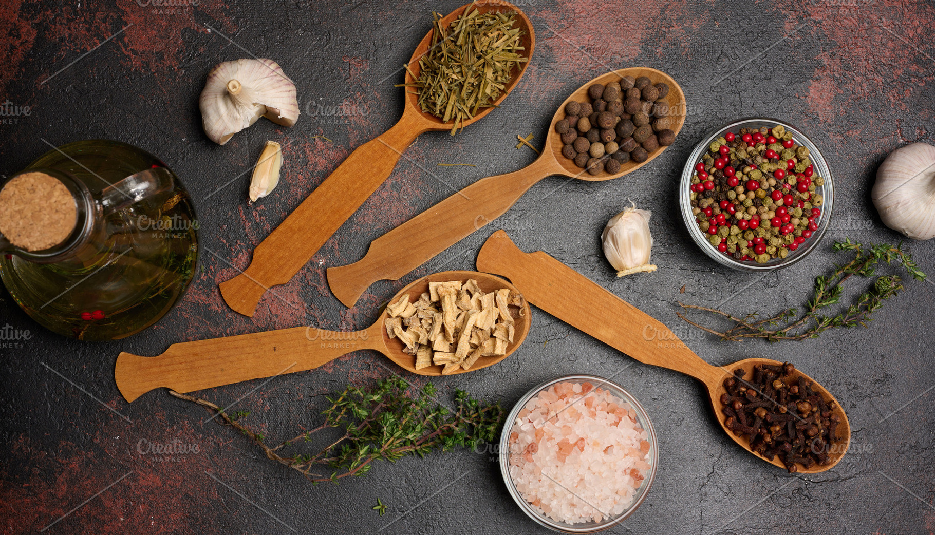Various culinary spices in wooden spoons on brown background, to, a Food & Drink Photo by ndanko
