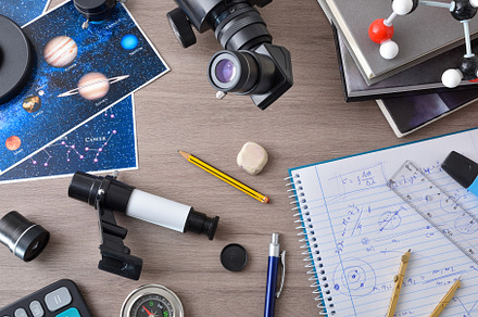 Astronomy student workspace with bench with items for astronomic, a School & Education Photo by Davizro's Market