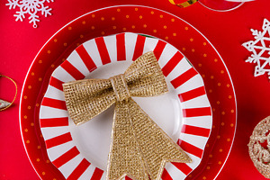 Christmas, New Year table setting with plate and Xmas ornaments