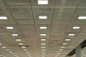 Ceiling of corporate office with lights in office building. Syst