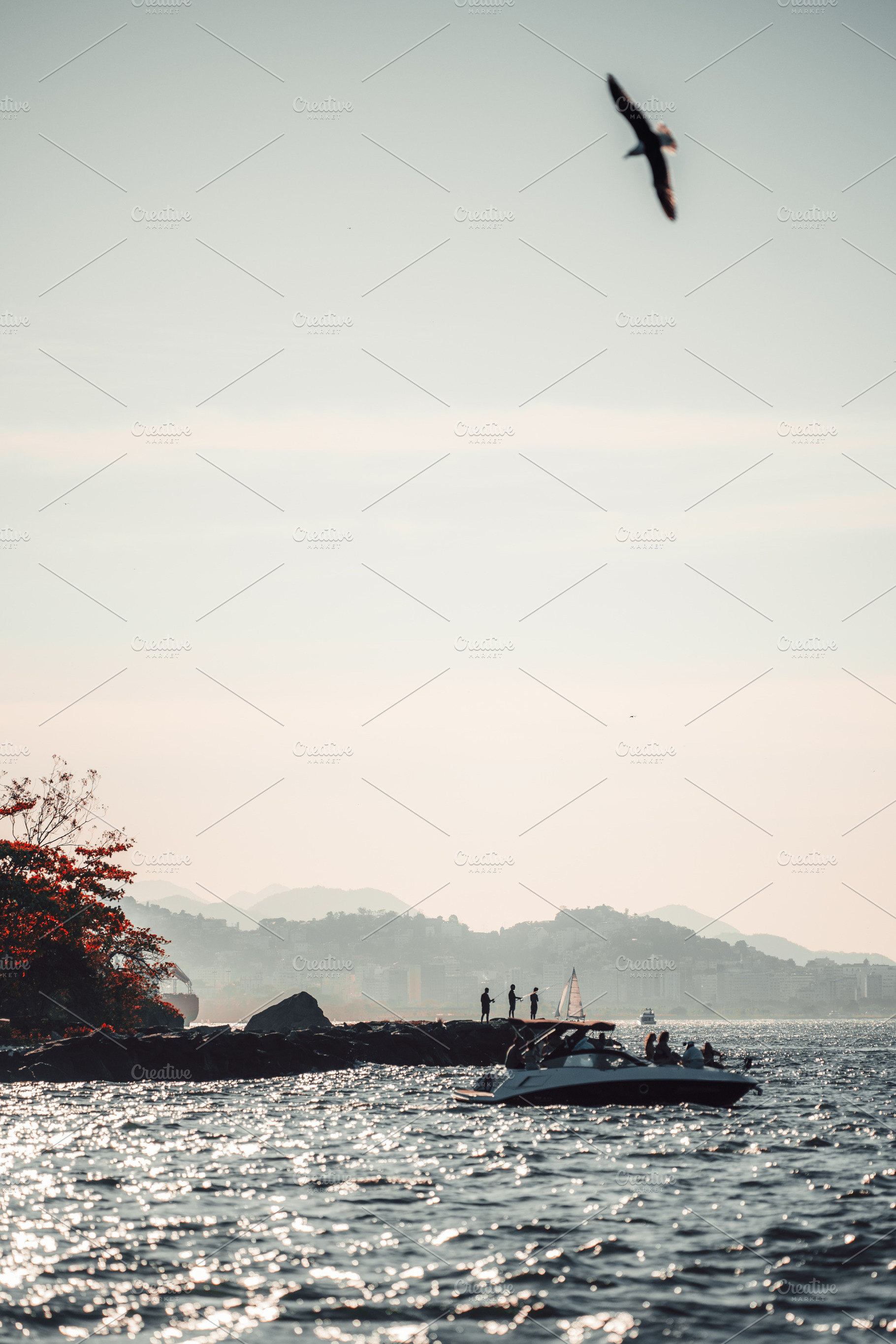 Silhouettes by shimmering water, a Sports & Recreation Photo by SkyNext