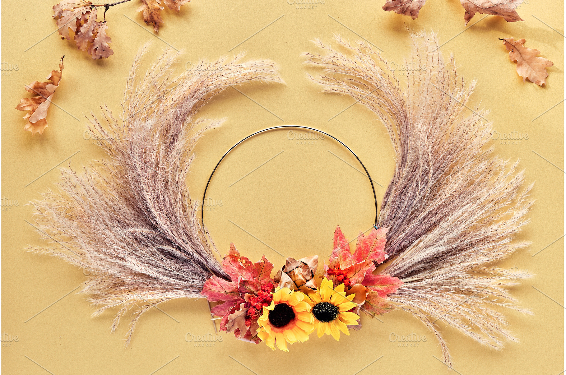 Hands making dried floral wreath, a Holiday Photo by tilialucida