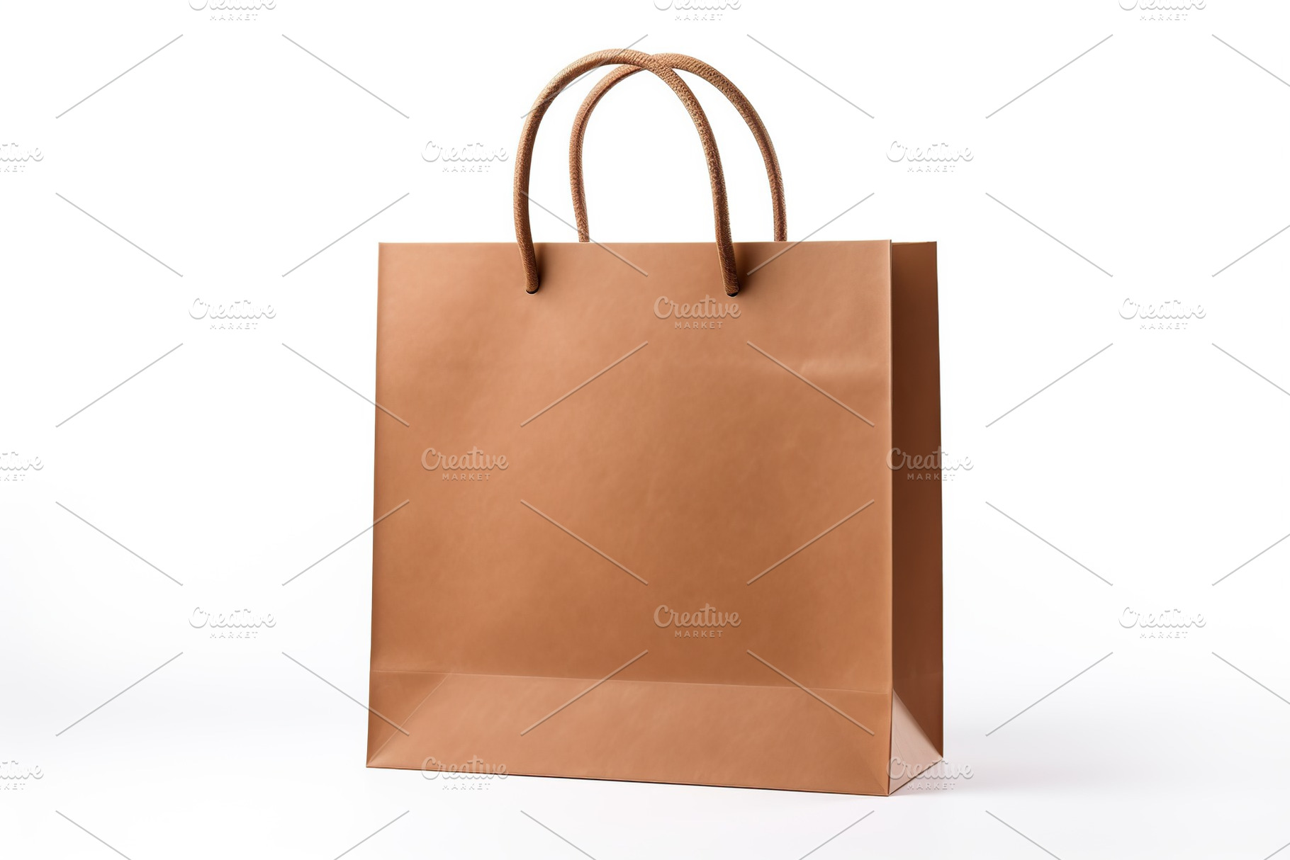 Brown paper shopping bag on white background, a Beauty & Fashion Photo by AlyaAnd