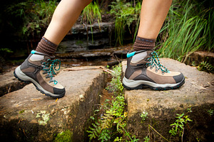 Hiking Boots, a Person Photo by THP Creative