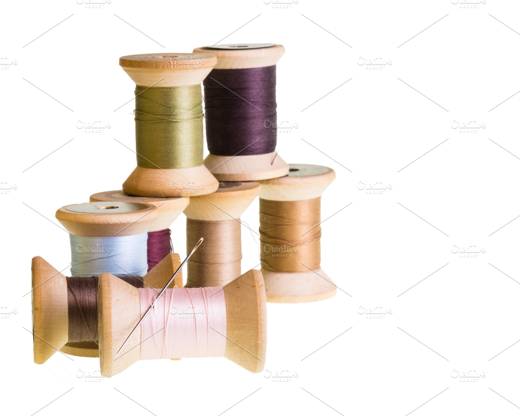 Spools of thread isolated on white featuring thread, sew, and sewing