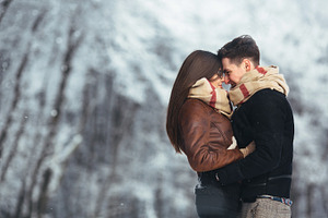 Happy couple in snow park stock photo containing amazing and snow