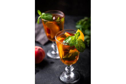 Cold ice tea with peach and mint, a Food & Drink Photo by Yulia Furman