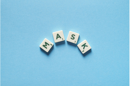 Mask formed of scrabble tiles., a Health & Medical Photo by Yaroslav Danylchenko