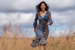 Woman runs through a field in autumn, a Photo by Beautiful things