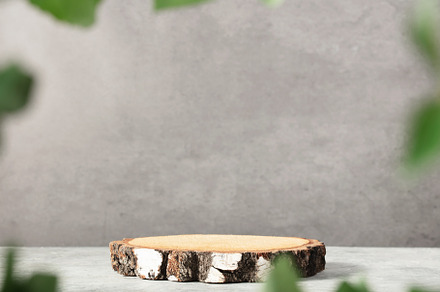 Wooden product display podium with blurred nature leaves backgro, an Abstract Photo by Natalia Klenova's Shop