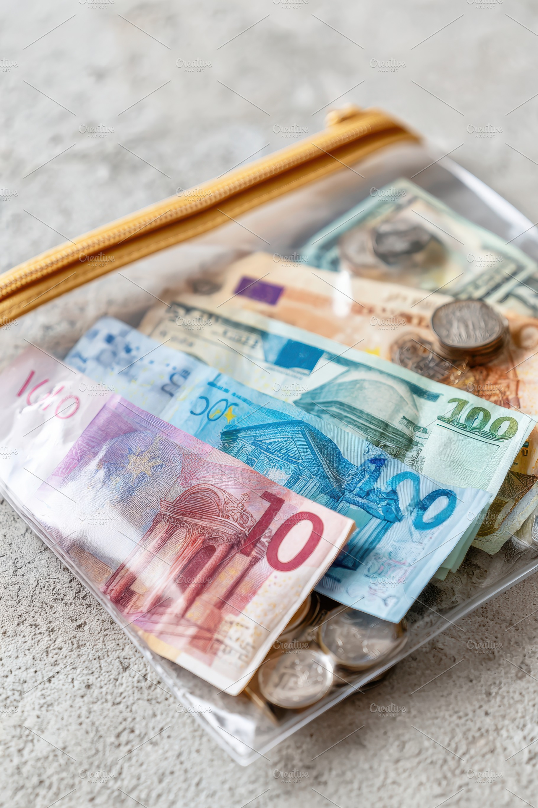 Cash in a clear ziplock bag, a Business Photo by AlyaAnd