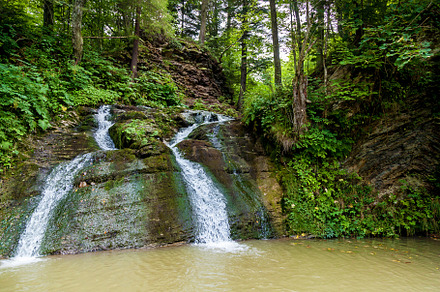 Forest waterfalls in the mountains, a Nature Photo by Photostock