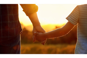 An adult and child holding hands, a Nature Photo by Igor Tichonow