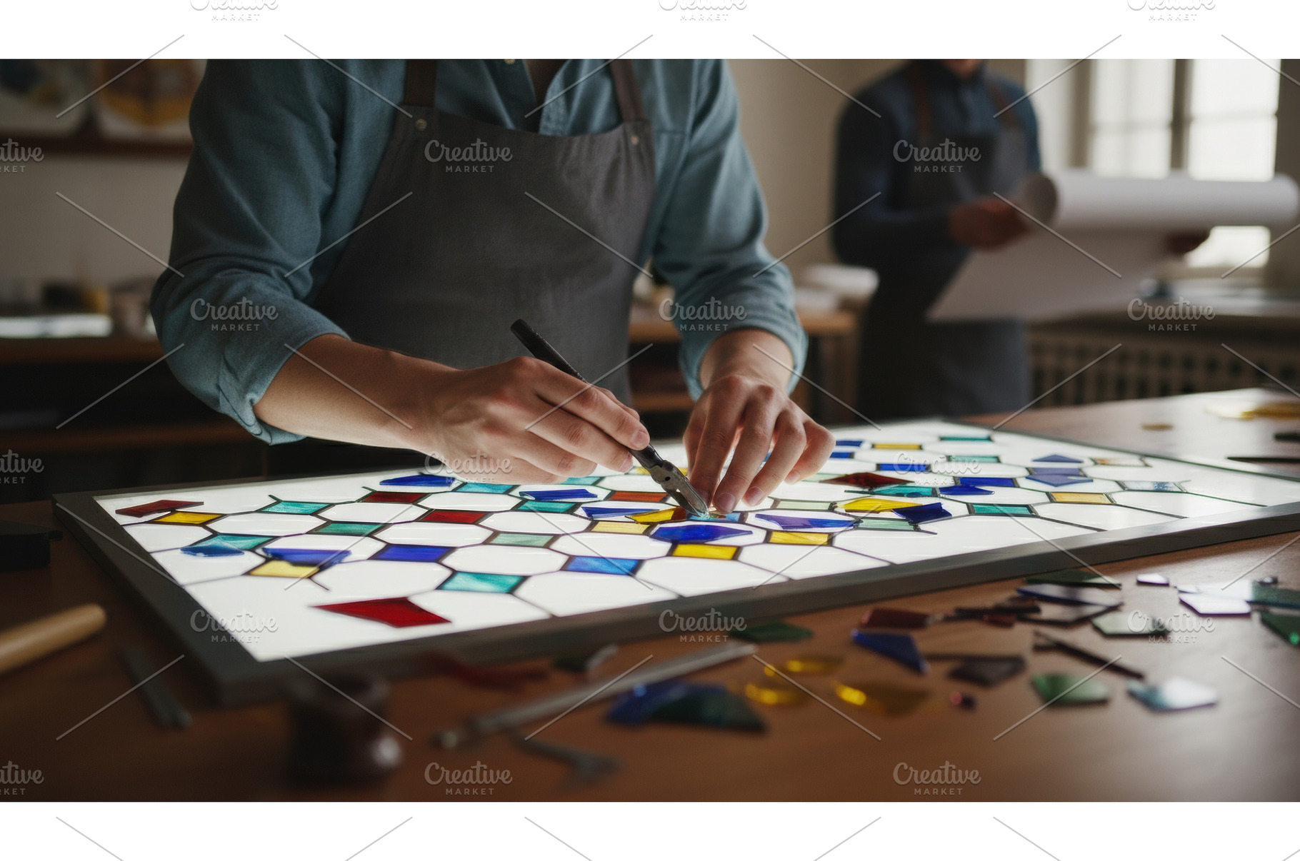 Craftsman hands working on a stained, an Arts & Entertainment Photo by Igor Tichonow