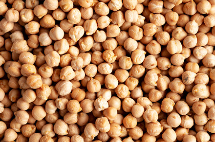 Dry Organic Chickpeas, top view. Flat lay. overhead, from above., a Food & Drink Photo by LiudmylaChuhunova