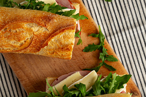 Homemade French Ham and Brie Baguette with Arugula Greens, top v, a Food & Drink Photo by LiudmylaChuhunova