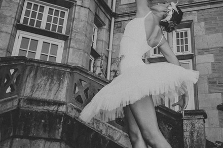Ballerina dancer stock photo containing adjusting and ballerina