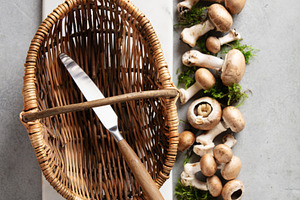 Wicker Basket and Fresh Mushrooms on Marble Cutting Board, a Food & Drink Photo by Natalia Klenova's Shop