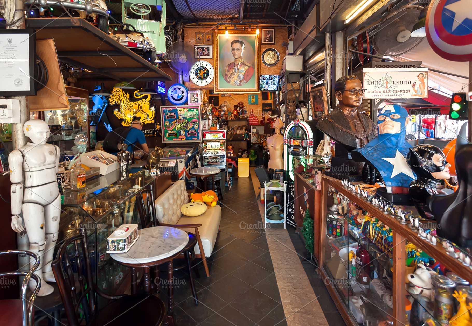 Posters, figurines in vintage store, an Arts & Entertainment Photo by Radiokafka