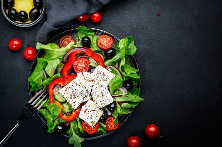 Greek salad with feta cheese, olives, cherry tomato, paprika, cu, a Food & Drink Photo by 5PH