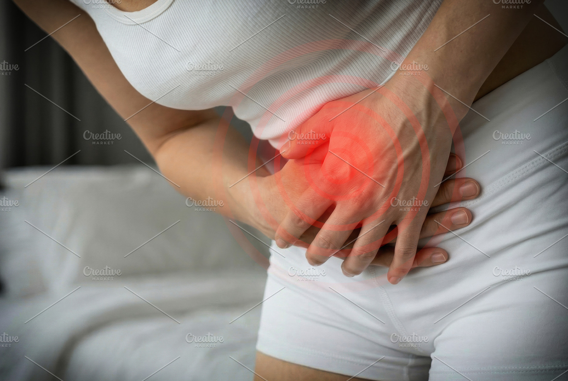 Title: Woman Holding Abdomen With Stomach Pain, a Health & Medical Photo by Davizro's Market