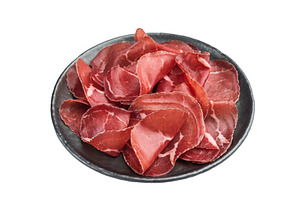 Thin cured beef slices cecina arranged on a dark plate over a cl, a Food & Drink Photo by composter-box@mail.ru
