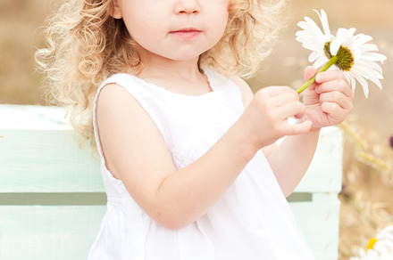Cute baby girl outdoors featuring human, decoration, and baby, a Person Photo by morrowlight