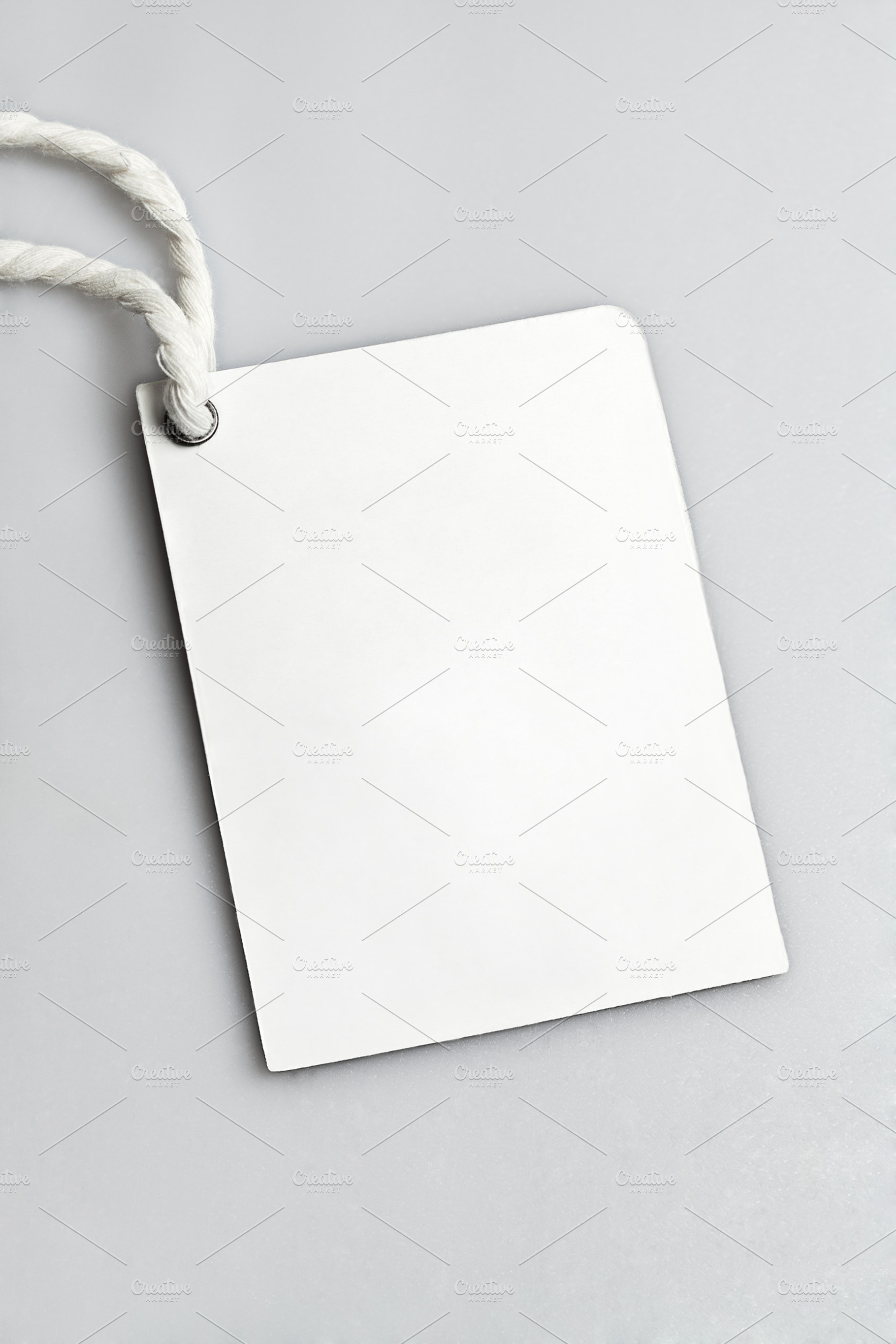 Cloth label blank tag containing background, blank, and closeup, a Business Photo by Olha Klein