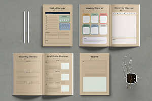 Daily Weekly Monthly Planner Book, a Brochure Template by MightyDesign