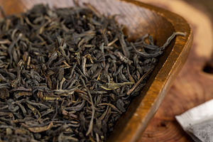 green large leaf tea made of high quality leaves and packaged tea, a Photo by rsoollAI