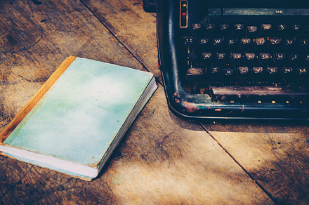 Typewriter featuring antique, author, and background