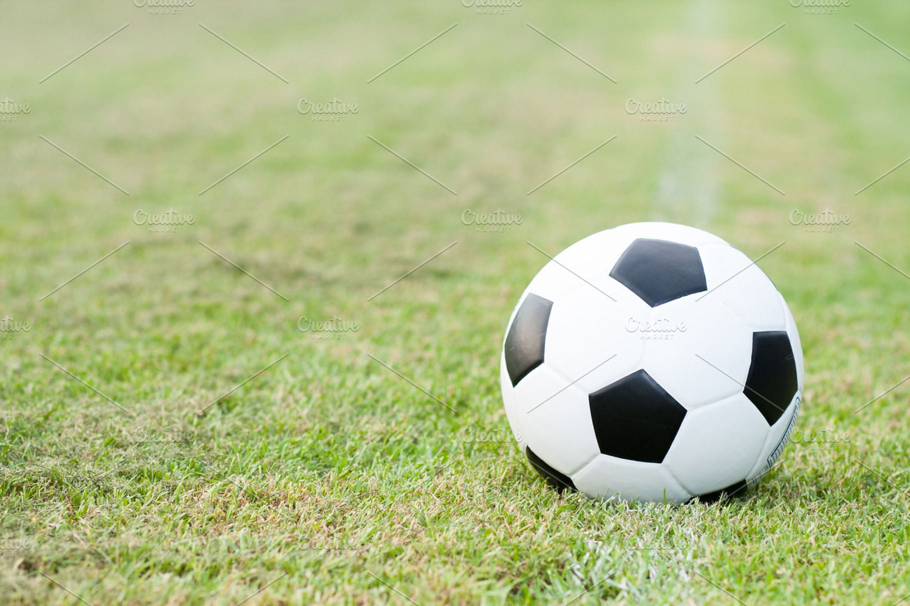Ball in grass featuring football, grass, and soccer, a Sports & Recreation Photo by a454