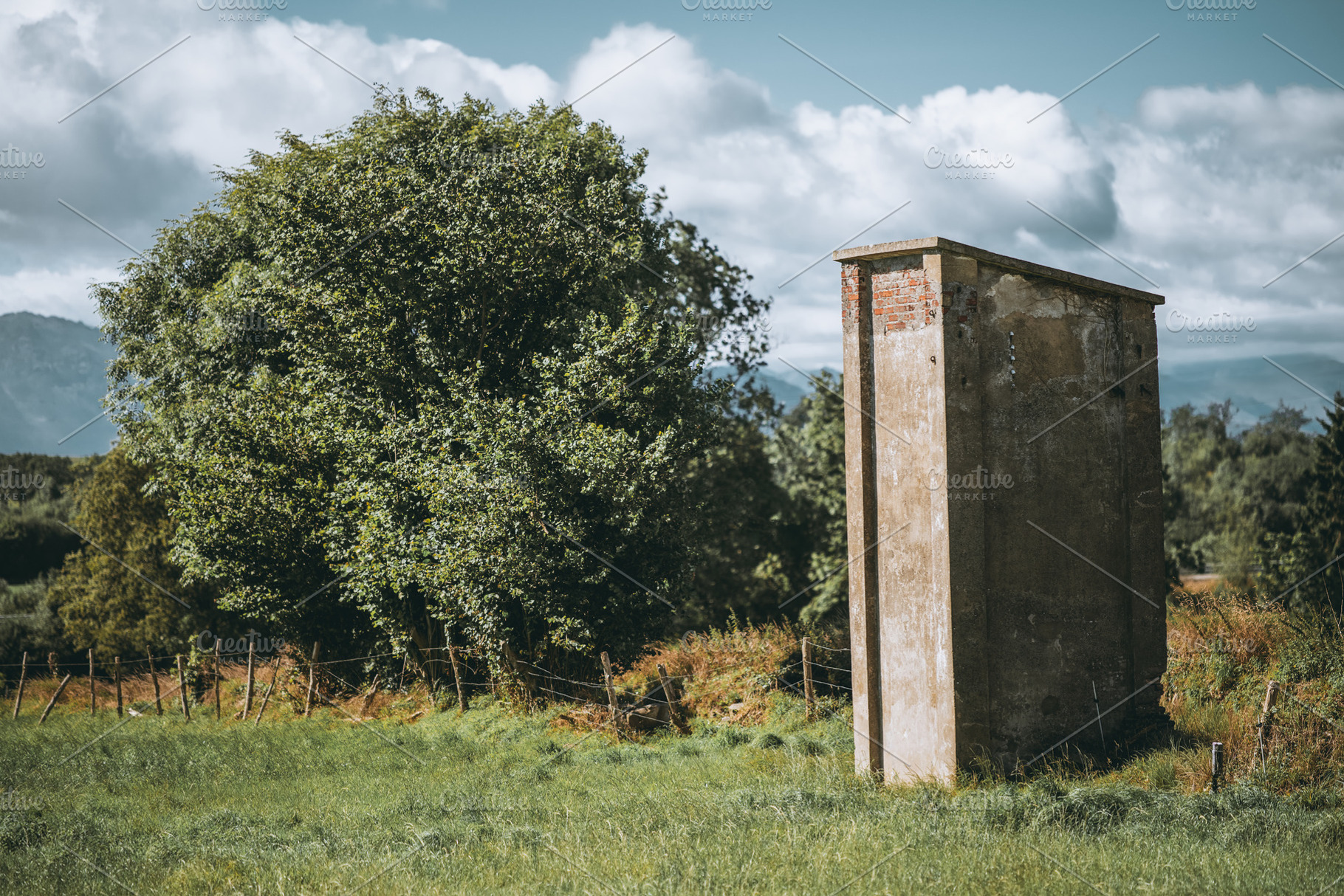 Old tower in green meadow, an Architecture Photo by SkyNext