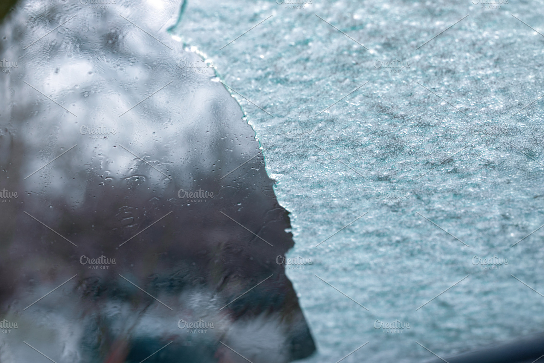 Closeup of a partially cleared car windshield covered in frost a, a Background Photo by Ales Munt