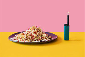 Pile of wooden matches on plate with, an Arts & Entertainment Photo by Gladkov photography