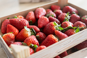 Fresh strawberries on wooden boxes, a Food & Drink Photo by etorres69