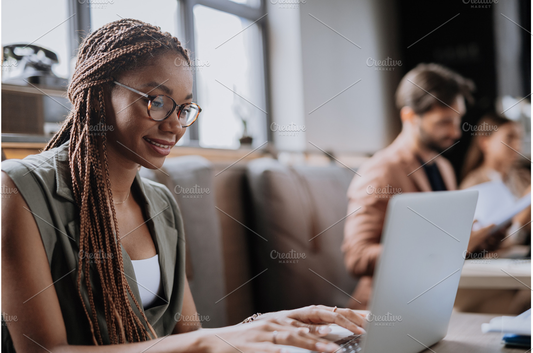 Beautiful businesswoman working on, a Business Photo by HalfPoint