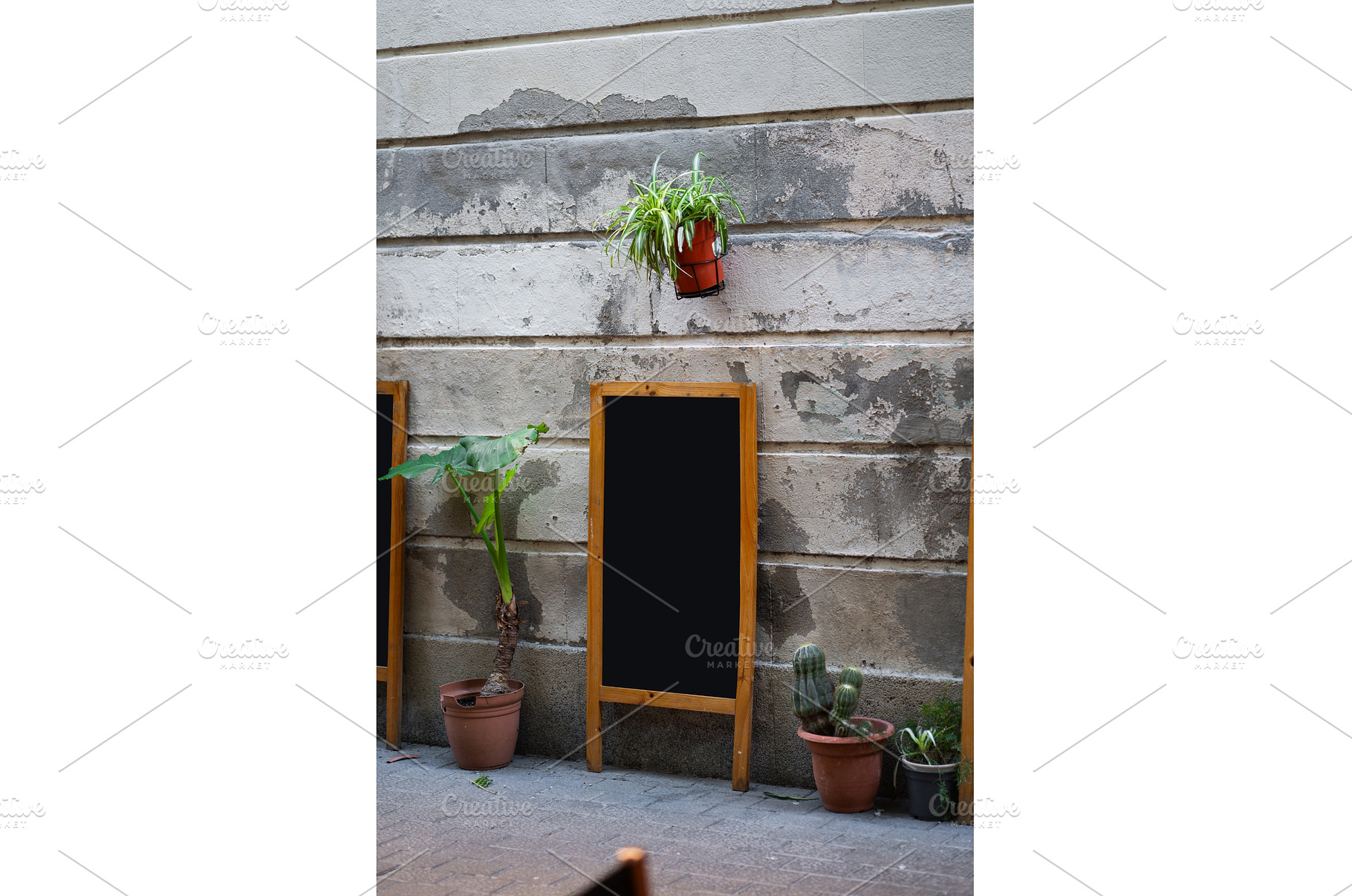 Blank wooden sandwich board standing, a Background Photo by volodymyrshtun13795
