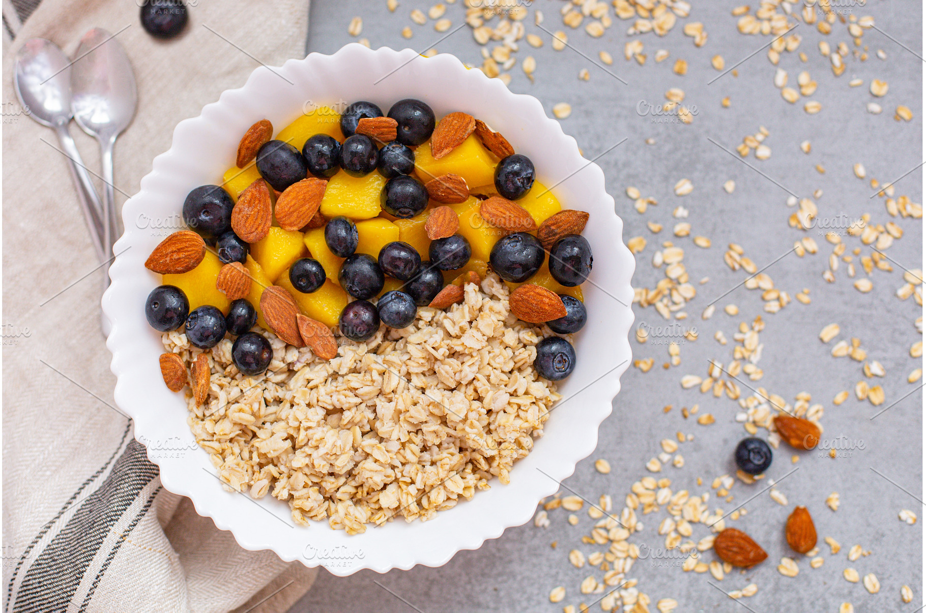 Bowl of oatmeal porridge with fresh, a Food & Drink Photo by Rodica Ciorba