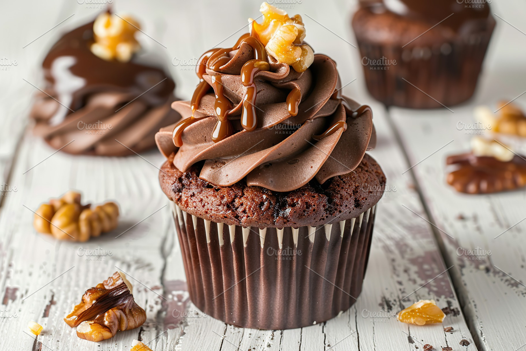 Chocolate cupcake with whipped cream and walnut on wooden table, a Food & Drink Photo by AlyaAnd