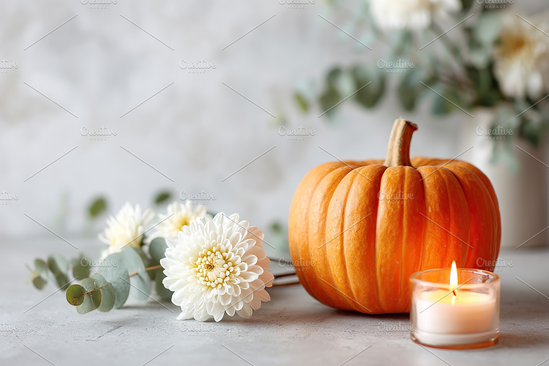 Fall decor featuring a pumpkin, flowers, and a candle on a table setting, a Holiday Photo by AlyaAnd
