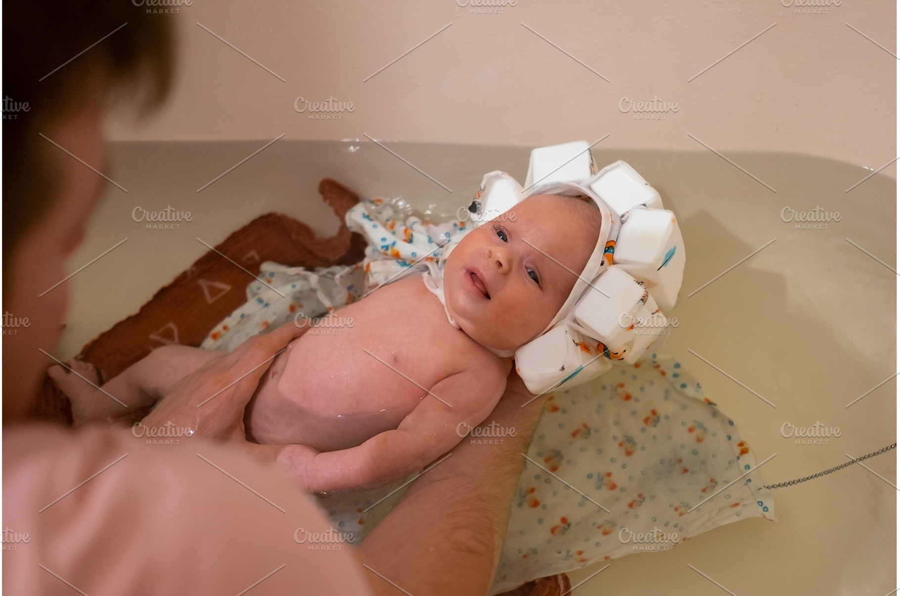 Baby having a bath wearing special, a Person Photo by Koldunova