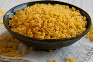 Homemade Perlini Pasta in a Bowl, side view. Close-up., a Food & Drink Photo by LiudmylaChuhunova