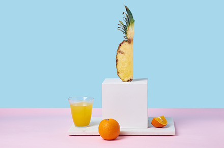Tropical fruits variety on a colorful background. Side view with