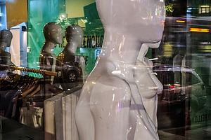 Store mannequin with urban reflections on glass, an Arts & Entertainment Photo by DanFLCreativo
