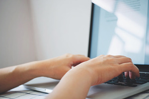 Female hands typing laptop stock photo containing technology and hand