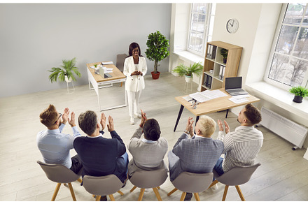 Business woman speaking on a meeting, a Person Photo by StudioRomantic