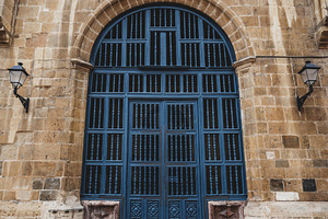 Blue arched door in Oviedo, an Architecture Photo by SkyNext