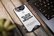 iPhone Mockup on Wooden Desk, a Device Mockup by Jiwstudio (Thumbnail 7 of 9)