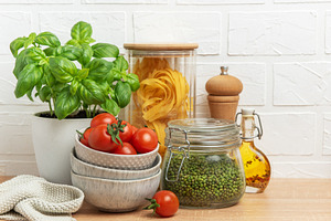 Fresh ingredients creating delicious italian cuisine on kitchen, a Food & Drink Photo by Olena Rudo